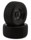 Two black tires with tread pattern on a white background